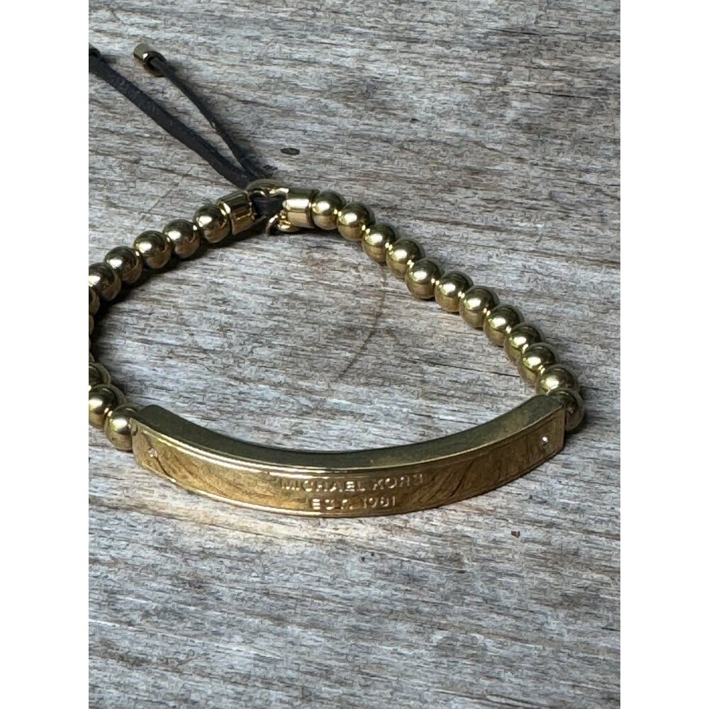 Michael Kors Bracelet Gold Tone Beaded With Engraved Bar And Adjustable Cord - Picture 2 of 6
